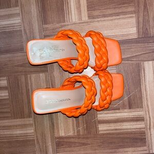 Neon orange heels